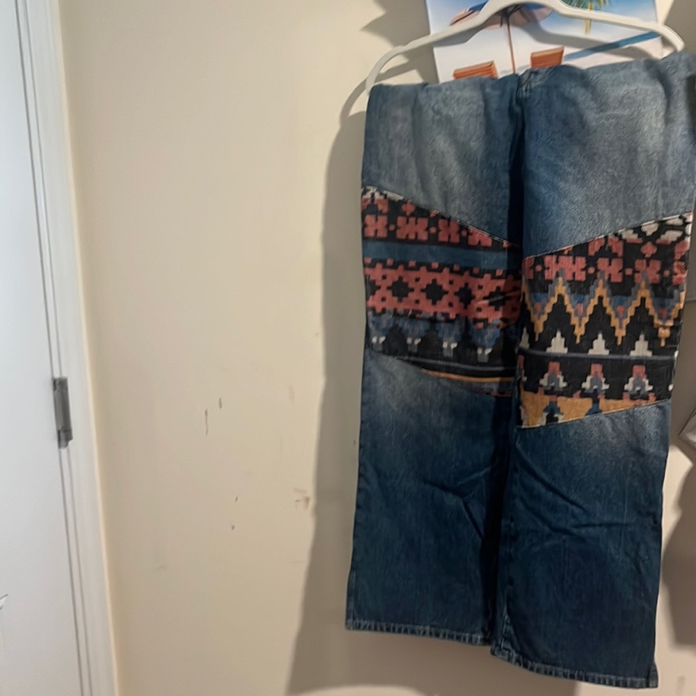 Gorgeous We the Free Denim Jeans with a button up fly.